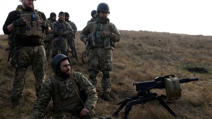 Soldiers from Carpathian Sich international battalion conduct manoeuvres near the front line, as Russia's attack on Ukraine continues, in Kreminna, Ukraine, January 3, 2023. REUTERS/Clodagh Kilcoyne