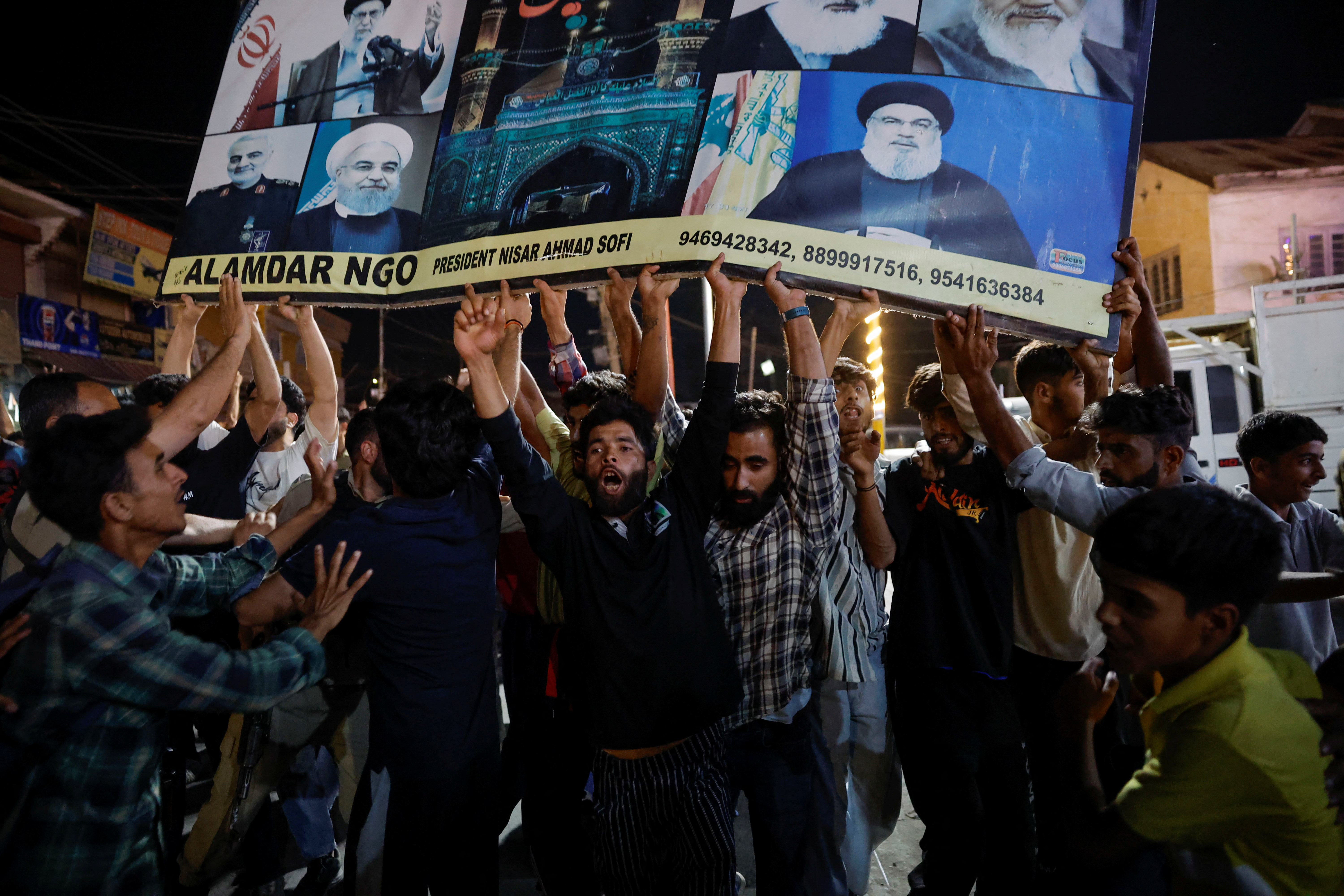 Kashmiri Shia Muslims shout slogans during a protest against Israel following the killing of Hezbollah leader Sayyed Hassan Nasrallah