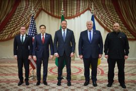 This handout photograph taken and released by Ukrainian Presidential Press Service on March 11, 2025, shows (From L) US National Security Advisor Mike Waltz, US Secretary of State Marco Rubio, Ukrainian Head of Presidential Office Andriy Yermak, Ukraine's Foreign Affairs Minister Andrii Sybiha and Ukraine's Minister of Defence Rustem Umerov as they pose for a photograph after attending the Ukrainian and US delegations meeting in Jeddah, amid the Russian invasion of Ukraine. (Photo by Handout / UKRAINIAN PRESIDENTIAL PRESS SERVICE / AFP) / RESTRICTED TO EDITORIAL USE - MANDATORY CREDIT "AFP PHOTO / UKRAINIAN PRESIDENTIAL PRESS SERVICE " - NO MARKETING NO ADVERTISING CAMPAIGNS - DISTRIBUTED AS A SERVICE TO CLIENTS