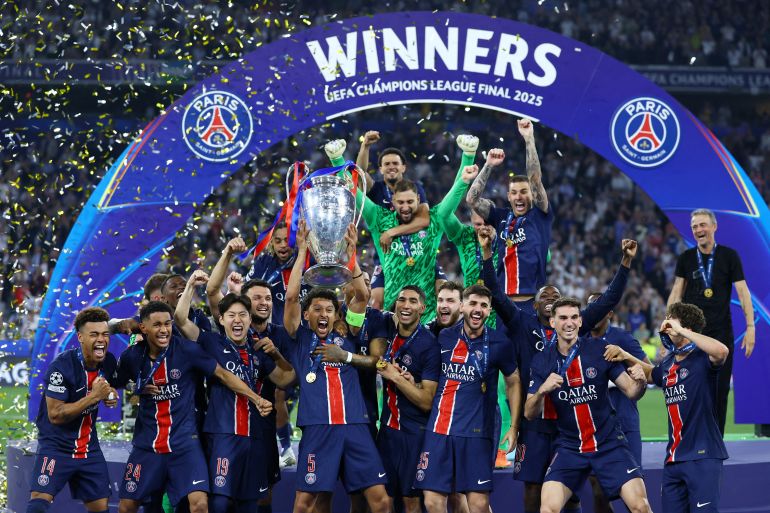 Champions League - Final - Paris St Germain v Inter Milan - Allianz Arena, Munich, Germany - May 31, 2025 Paris St Germain's Marquinhos lifts the trophy as he celebrates with teammates after winning the Champions League