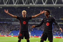 Barcelona's Spanish forward Lamine Yamal celebrates scoring against Espanyol in La Liga