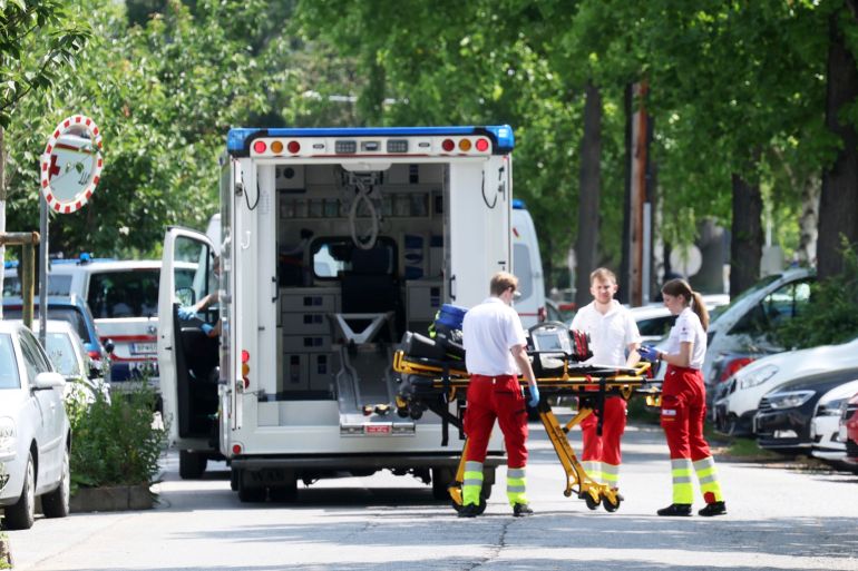 Rescue service personnel attend the scene of a shooting at a school in Graz, Austria, Tuesday, June 10, 2025. 