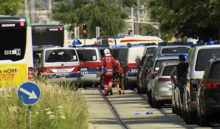 In this image made from video provided by Servus TV, police at the scene of a shooting at a school in Graz, Austria, Tuesday, June 10, 2025.