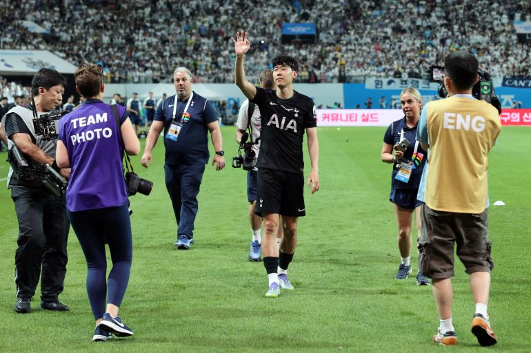 Tottenham Hotspur's Son Heung-Min acknowledges fans after playing his last game for the club in South Korea