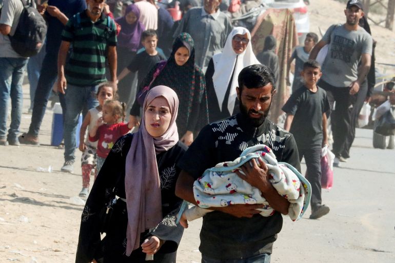 Displaced Palestinians, fleeing northern Gaza due to an Israeli military operation