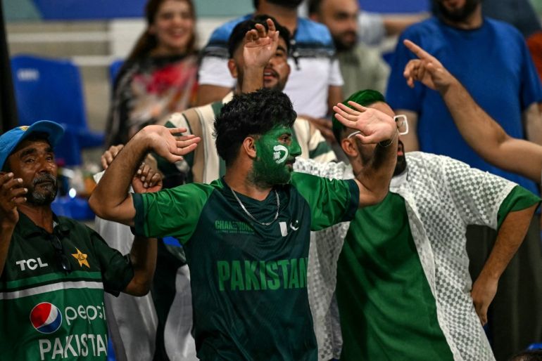 Pakistan's fans cheer during the Asia Cup 2025 Super Four Twenty20 international cricket match between Pakistan and Sri Lanka at the Sheikh Zayed Cricket Stadium in Abu Dhabi on September 23, 2025. (Photo by Sajjad HUSSAIN / AFP)
