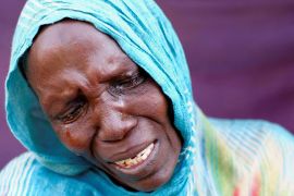 A woman from el-Fasher cries after learning about the killing of her son and brother, in a camp in Al-Dabbah, Sudan, on November 3, 2025 [El Tayeb Siddig/Reuters]