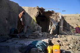 An Afghan man inspects a damaged house, following cross-border fire from Pakistan&#039;s artillery shelling, at a village in the Spin Boldak district of Kandahar on November 7, 2025 [Sanaullah Seiam/AFP]