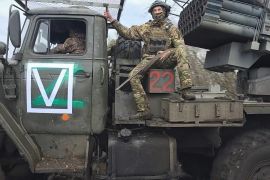 In this image, clipped from a video on November 6, 2025, Russian soldiers ride a Tornado-G self-propelled multiple rocket launcher to fire towards Ukrainian positions on an undisclosed location in Ukraine [Russian Defence Ministry Press Service via AP Photo]