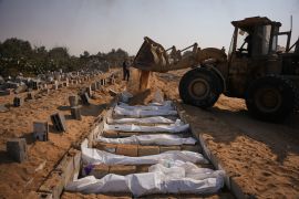 Bodies of unidentified Palestinians returned from Israel as part of the ceasefire deal are buried in a mass grave in Deir el-Balah in the Gaza Strip, Wednesday, November 5, 2025 [Abdel Kareem Hana/AP Photo]