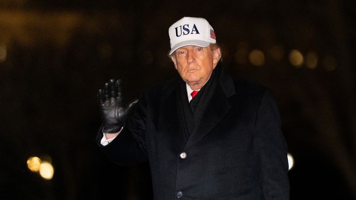 President Donald Trump waves as he walks from Marine One after arriving on the South Lawn of the White House, Tuesday, Jan. 27, 2026, in Washington. (AP Photo/Alex Brandon)